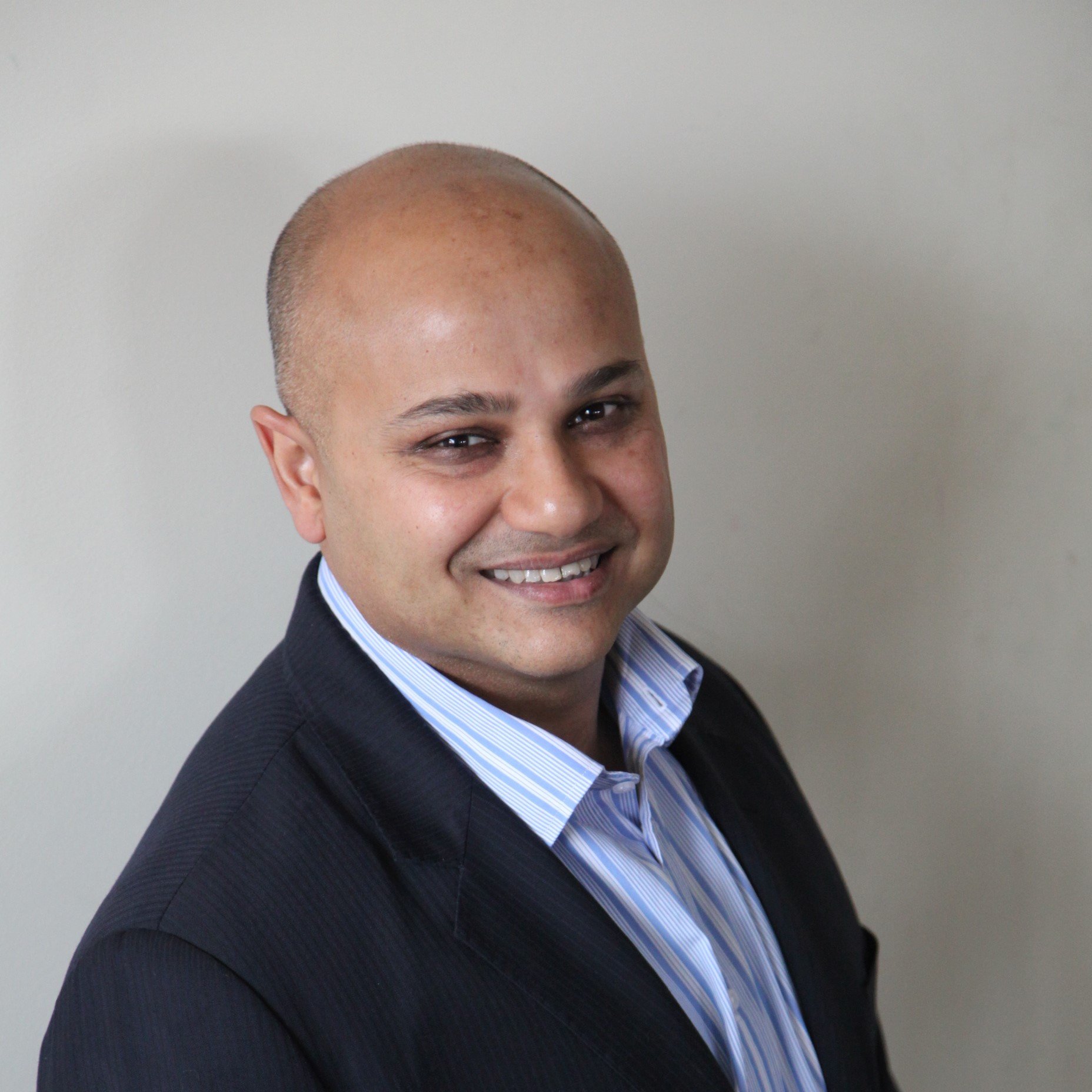 Ash Roy, CPA, MBA and host of the Productive Insights Podcast